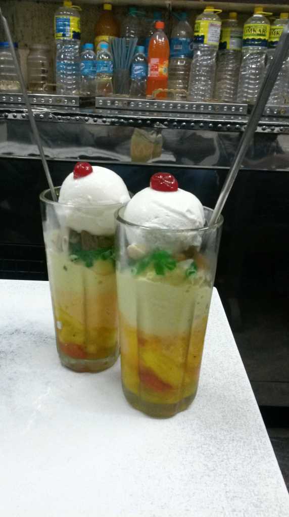 Gadbad.. 3 scoops of handmade  with sugar soaked fruits and fried fruits. 